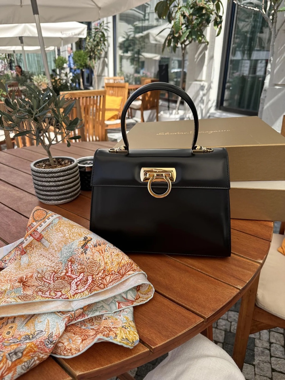 Ferragamo’s Iconic Top Handle Bag